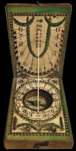 Pocket sundial/compass with lid open