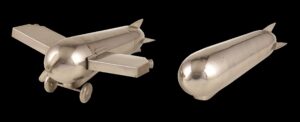 Art Deco cocktail shakers shaped like an airplane and a zeppelin by J.A. Henckels