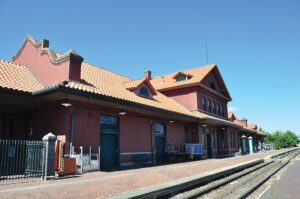 Red brick Amtrak depot with tracks visible in front