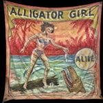 Square banner with "Alligator Girl" printed at the top and woman standing on a log in water, feeding an alligator