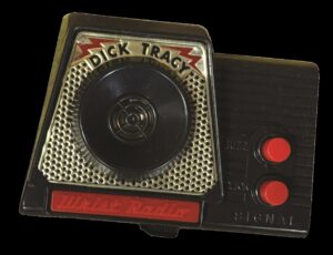 Black rectangular wrist radio toy labeled "Dick Tracy"