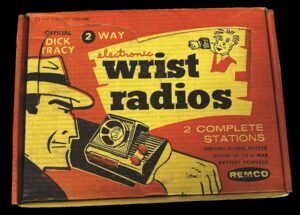 Red box labeled "Dick Tracy 2 Way Wrist Radios" with illustration of Dick Tracy in black and yellow