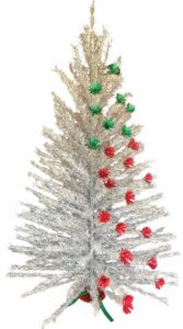 Silver aluminum Christmas tree with green and red pom-poms on the ends of branches on the right side
