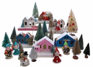 26-piece Christmas set with pine trees, pastel color houses, and figurines